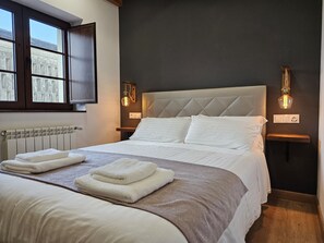 Een strijkplank/strijkijzer, gratis wifi, beddengoed