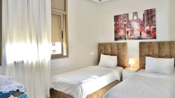 3 chambres, coffres-forts dans les chambres, Wi-Fi gratuit