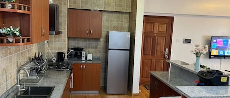 Apartment, 2 Bedrooms, Pool Access | Private kitchen | Fridge, microwave, oven, stovetop