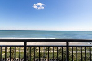 Enjoy breathtaking views of the ocean from this beachfront balcony.