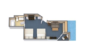 Suíte de dois quartos com varanda, cozinha compacta, banheiro e sala de estar com sofá e mesa de centro.