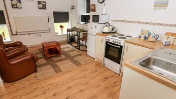 Fridge, electric kettle, toaster, cookware/dishes/utensils