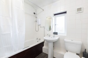 Hair dryer, towels, soap, shampoo