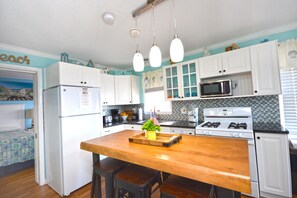 Fridge, microwave, stovetop, dishwasher - Cozy two bedroom condo, located right off the boardwalk for perfect family vacations! (Ocean City)