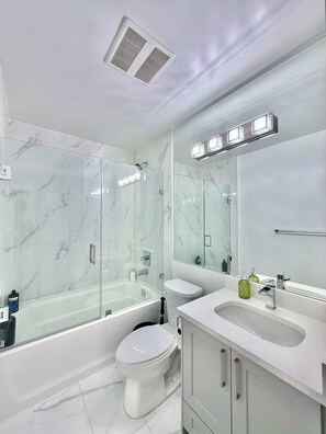 Hair dryer, towels, soap, toilet paper