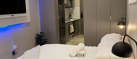 1 غرفة نوم ومكواة/لوح كي وواي فاي وملاءات أسرّة