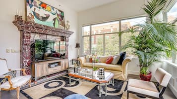 Apartment (2 Bedrooms) | Living area | TV, DVD player, books