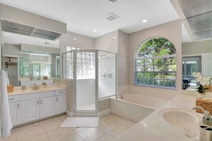 Shower, hair dryer, towels, shampoo