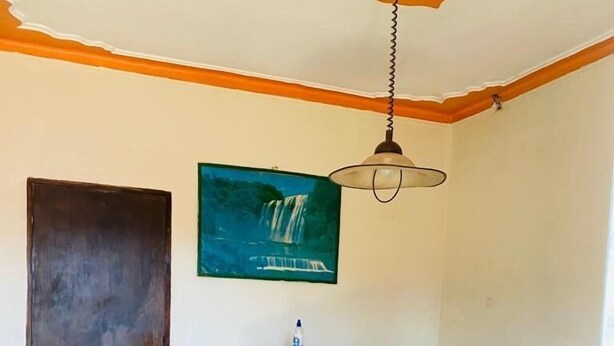 Deluxe Single Room | Living area - Kalifonia Guest House (Kampala)