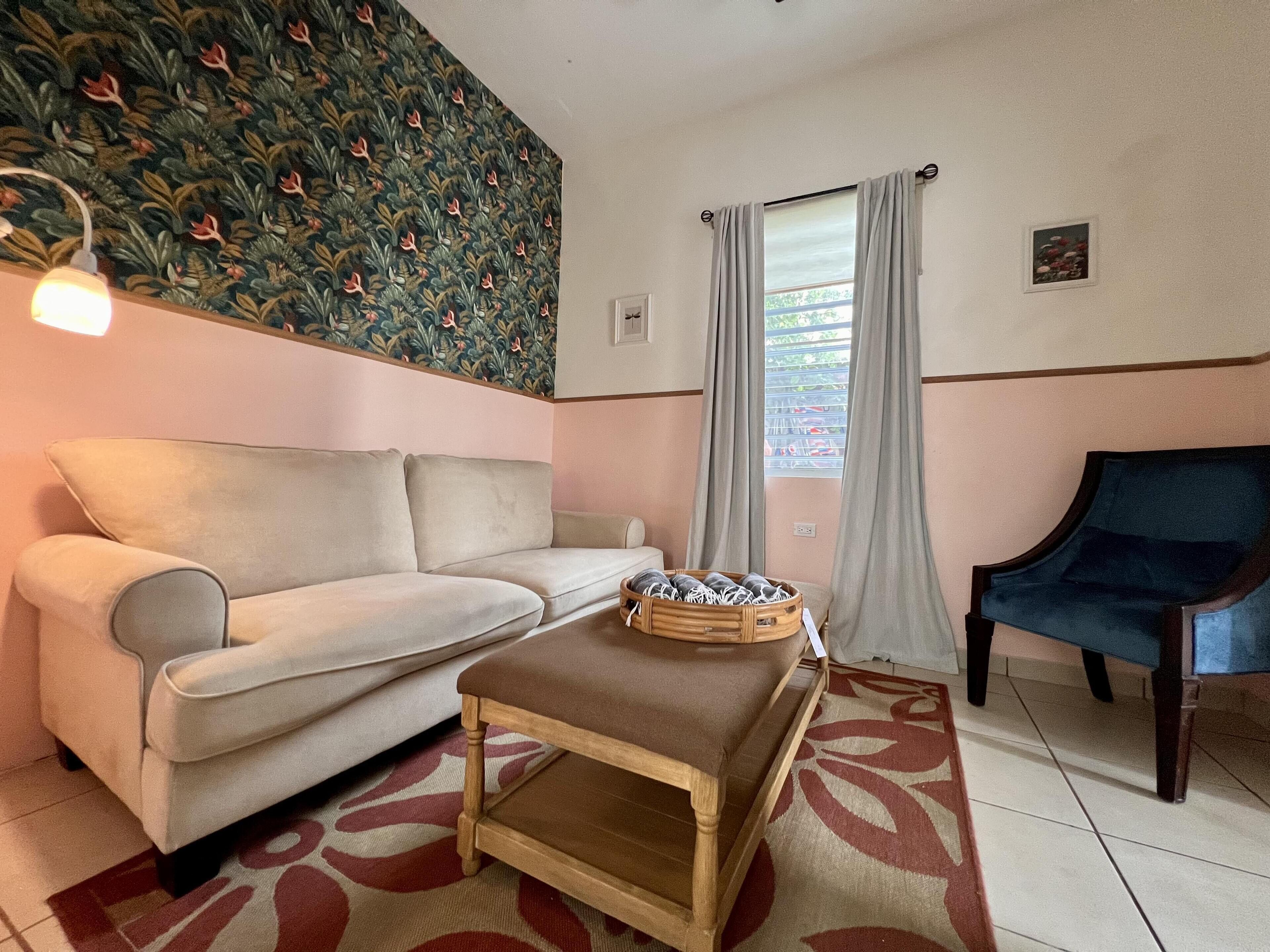 Family Suite | Living area | 62-inch Smart TV with digital channels, Netflix, toys