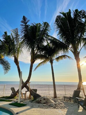 On the beach, sun loungers, beach towels