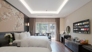 A modern hotel room with two beds, a desk, a TV, and a large window with a view of the city. - Palago Boutique Hotel (Hanoi)