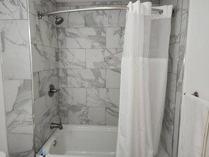 Hair dryer, towels, soap, shampoo