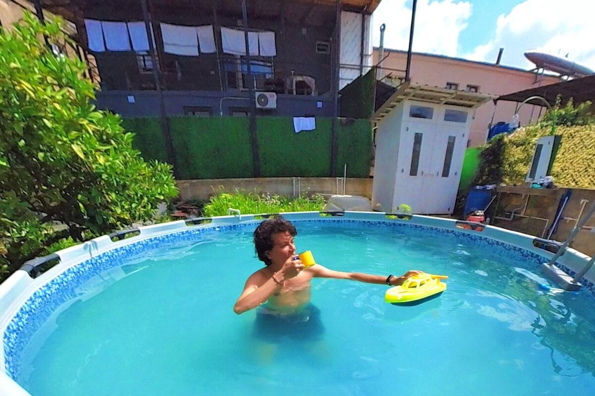 Desk, laptop workspace, blackout drapes, soundproofing