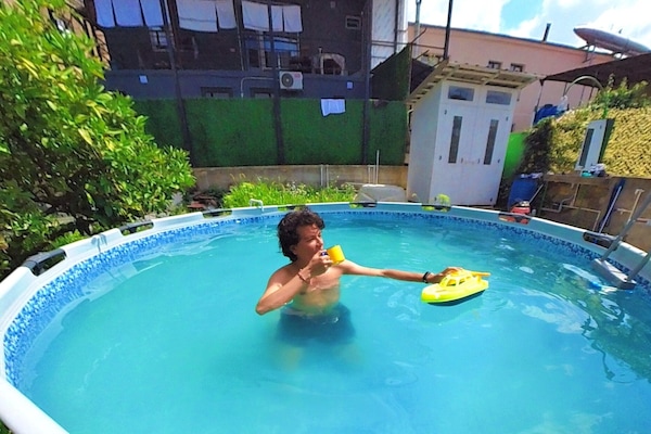 Desk, laptop workspace, blackout drapes, soundproofing