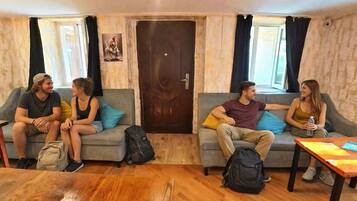 Desk, laptop workspace, blackout drapes, soundproofing