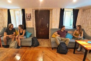 Desk, laptop workspace, blackout drapes, soundproofing