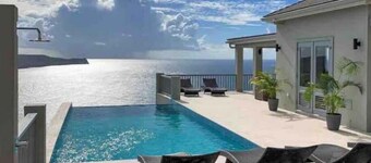 Luxury and tranquility in a 5 suite villa with 280 degree ocean views 