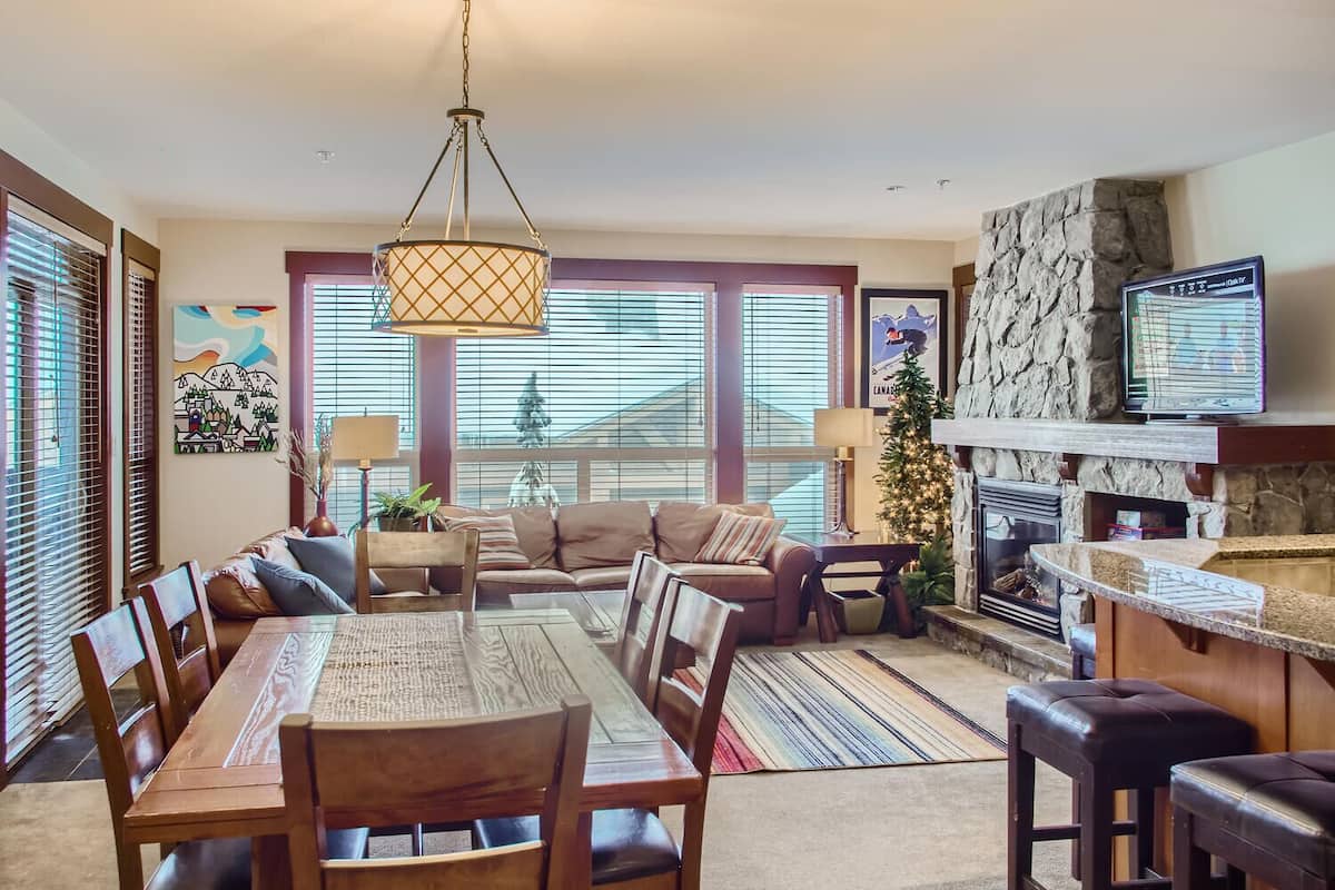 Stonegate Resort Unit A202 | Living area | Flat-screen TV, fireplace