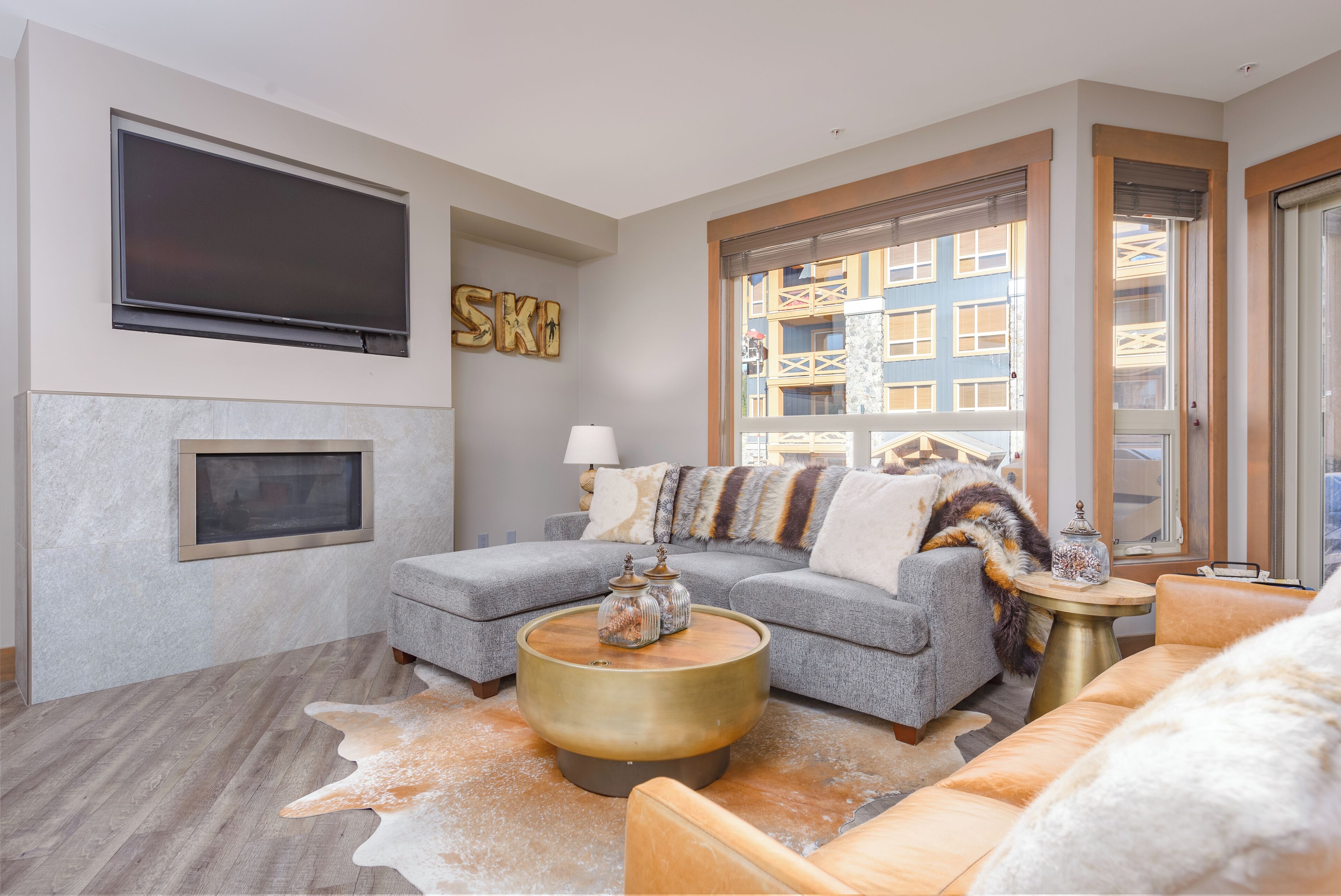 Stonegate Resort Unit B206 | 1 BR + DEN | Living area | Flat-screen TV, fireplace