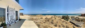 Enjoy breathtaking views of the ocean and beach from this property's balcony.