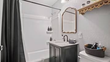 Hair dryer, towels, soap, shampoo