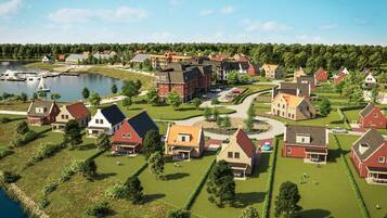Houses with various architectural styles are nestled among lush greenery and a serene body of water.