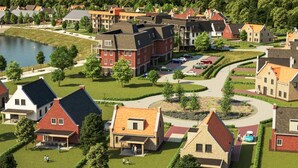 Um bairro residencial com casas, um lago e um gramado bem cuidado.