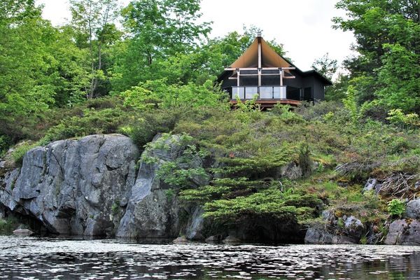 The Aerie Cabin Perched on a Granite Cliff Overlooking Pine Brae Pond