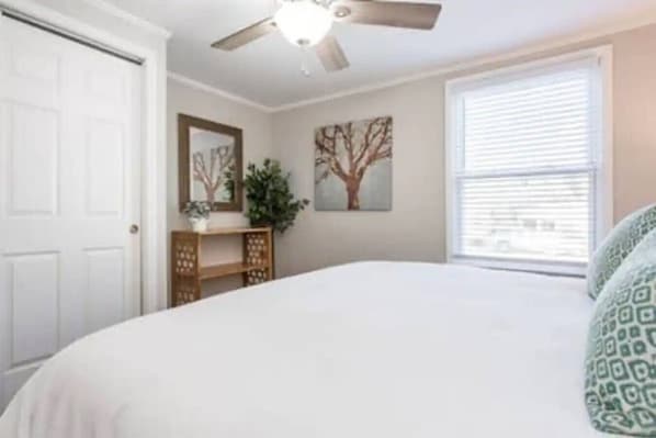 4 bedrooms, desk, iron/ironing board, travel cot