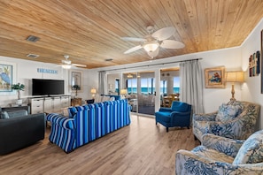 Panoramic House, 3 Bedrooms, Patio, Beachfront | Living area - Sunny Beach by Book That Condo (Panama City Beach)