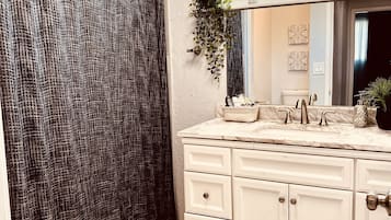 Hair dryer, towels, soap, toilet paper