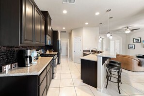 Fridge, microwave, oven, stovetop - Palms Place | Fairway Views + Pool & Spa | Pets OK (Indio)