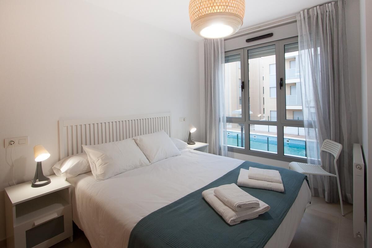 2 slaapkamers, een strijkplank/strijkijzer, beddengoed