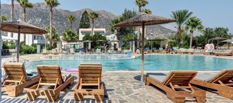 Studio 'Evripides Triple Room 2' avec piscine partagée, jardin partagé et climatisation