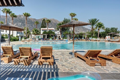 Appartement 'Evripides Family One -bedroom 2' avec piscine partagée, jardin partagé et climatisation