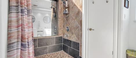 Shower, hair dryer, towels, soap