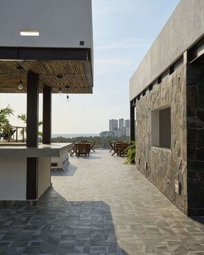 Outdoor dining - Brand New Condo in Versalles (Puerto Vallarta)