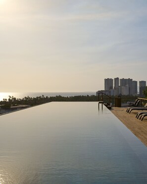 Outdoor pool, a heated pool - Brand New Condo in Versalles (Puerto Vallarta)