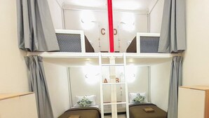 A bunk bed room with a - ReVive by Snooze (Banyuwangi)