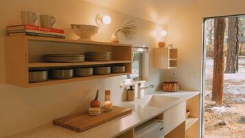 Oven, stovetop, coffee/tea maker, cookware/dishes/utensils