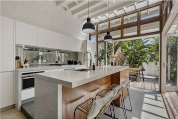 Beautiful light filled kitchen and outside deck
