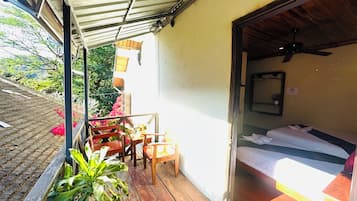 Standard Triple Room, City View | Terrace/patio