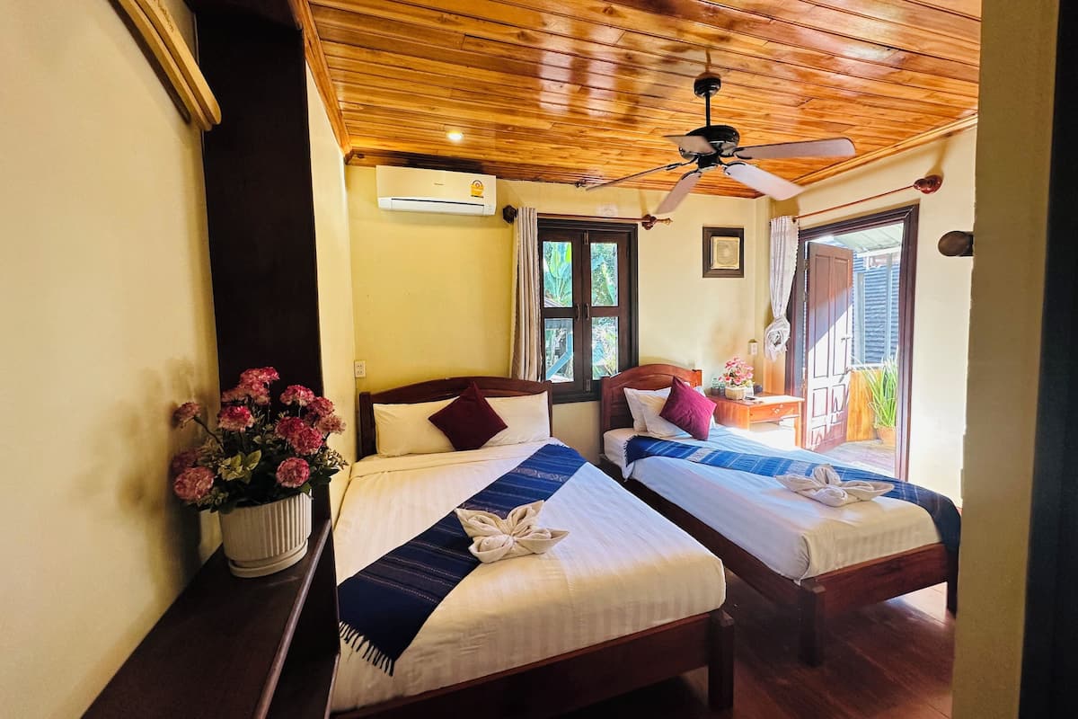 Kolmen hengen standard-huone, kaupunkinäköala | Ylelliset vuodevaatteet, untuvapeitot, yksilöllisesti sisustettu