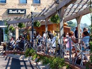 Outdoor dining - The Loft on Gillis | AC | Downtown | Beach | Rooftop | (Traverse City)