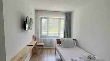 Standard Single Room | Desk, bed sheets
