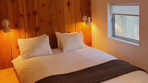A bed with white bedding, a brown throw blanket, and two wall-mounted light fixtures. - The Place Beyond The Pines - Two Bedroom  / C6 (Big Bear Lake)