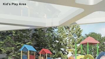 A children's play area with various play structures including slides and climbing frames.