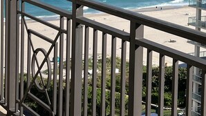 A balcony with a view of the ocean and beach. - Luxury ocean and sunset views from spacious condo in Palm Beach Resort and Spa 1802 (Singer Island)