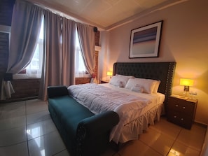 Suite Deluxe | 1 dormitori, roba de llit d'alta qualitat i cobrellits